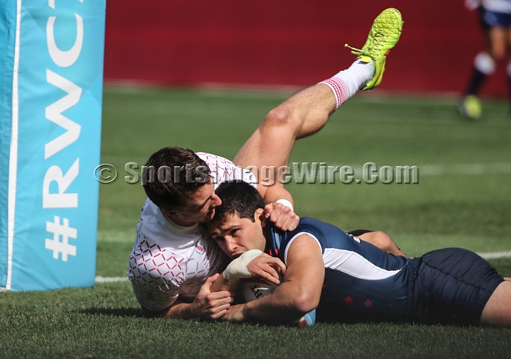 2018RugbySevensSat-30.JPG - United States player Madison Hughes scores a try against England in the men's championship quarter finals of the 2018 Rugby World Cup Sevens, Saturday, July 21, 2018, at AT&T Park, San Francisco. England defeated USA 24-19 in sudden death play. (Spencer Allen/IOS via AP)